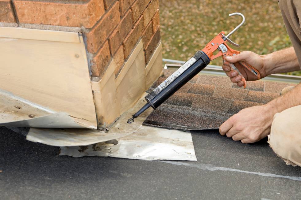 a person is repairing the chimney