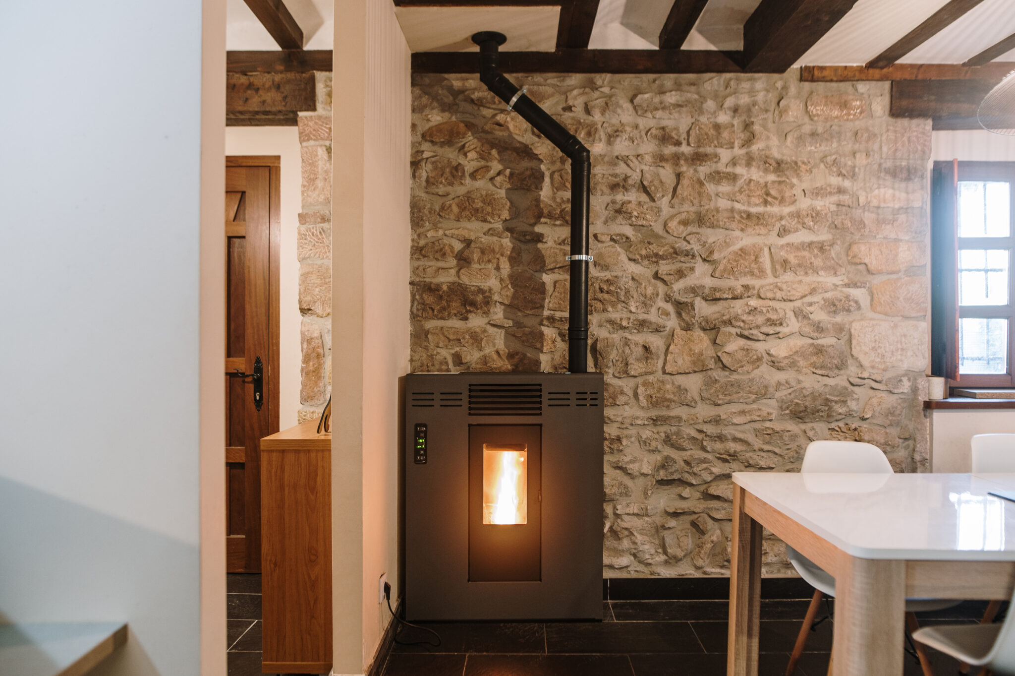 Burning biomass / Pellet stove inside a house